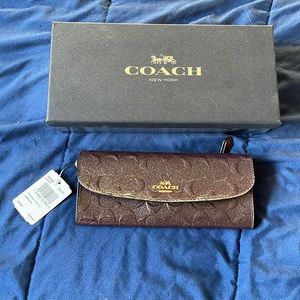 Coach wallet with charms NWT Never used